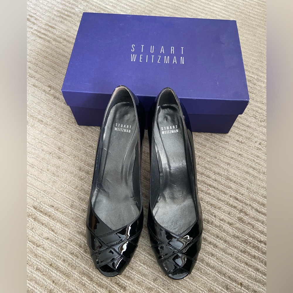Black Stuart Weitzman heels.